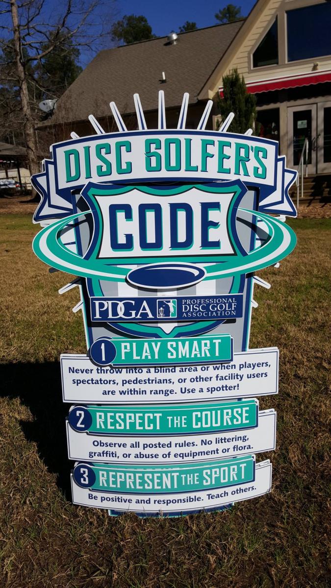3D Disc Golfer's Code sign at the International Disc Golf Center